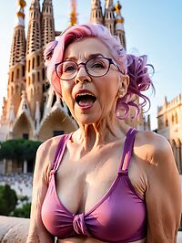 Elderly model poses seductively in pink bodypaint Basilica de la Sagrada Familia